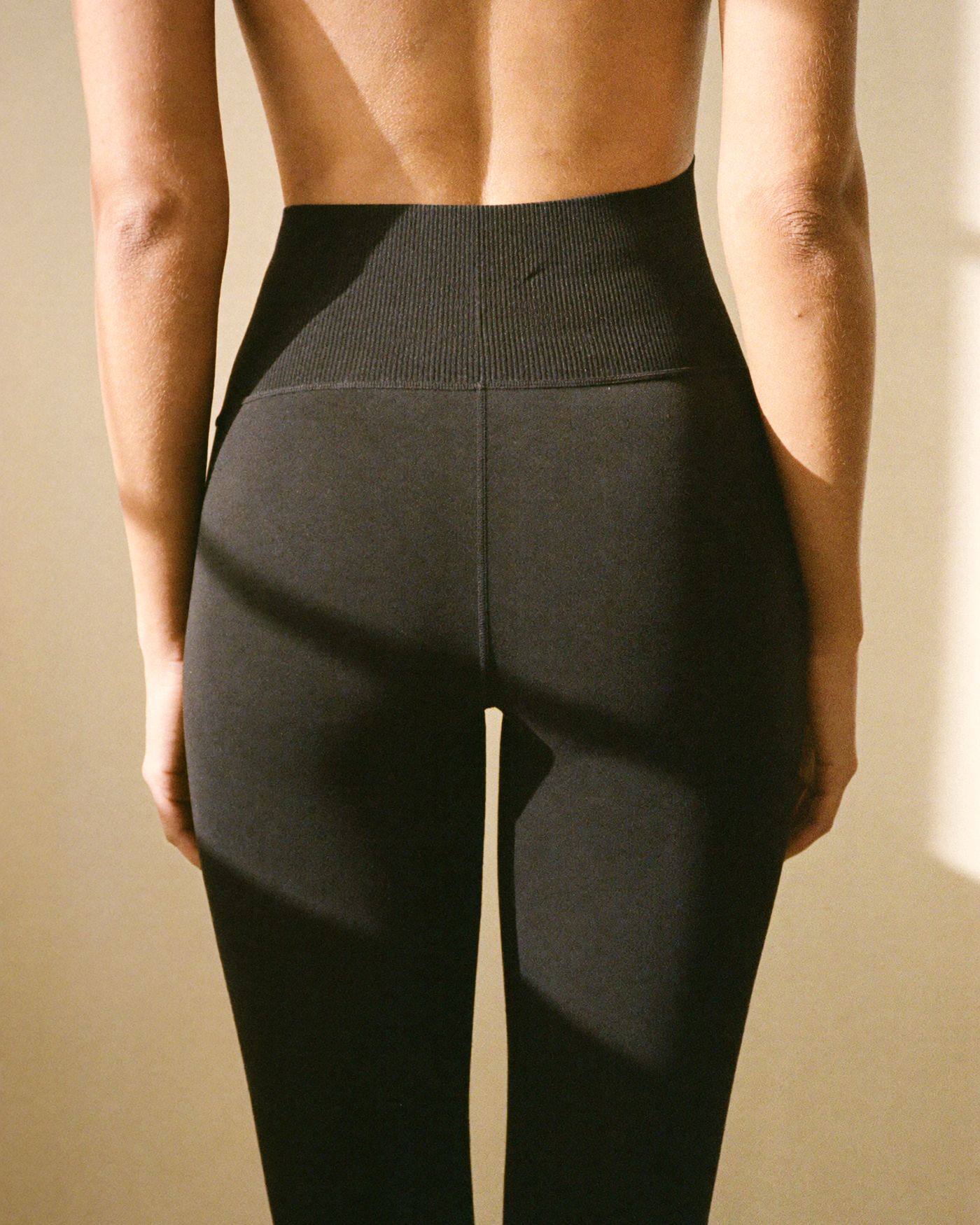 The Luna legging from behind, showing the wide ribbed waistband